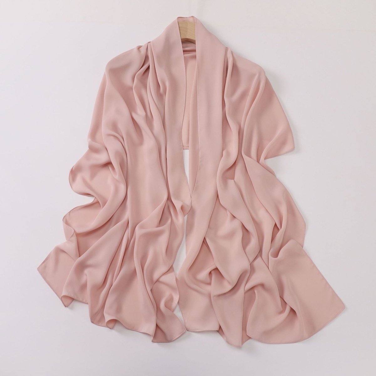 Pink scarf on a white background