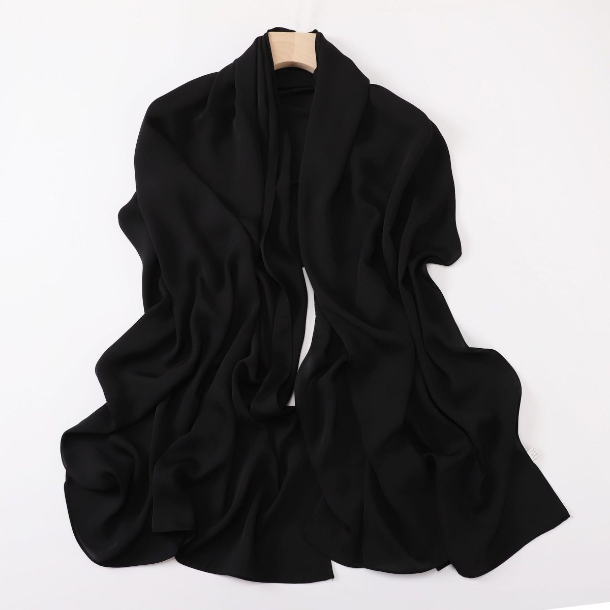 Black scarf on a white background